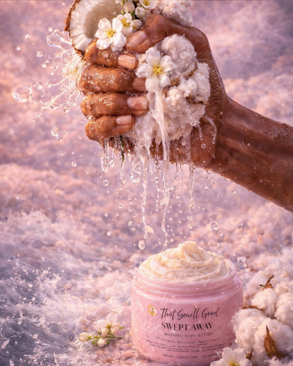 Hand holding cotton with a jar of &