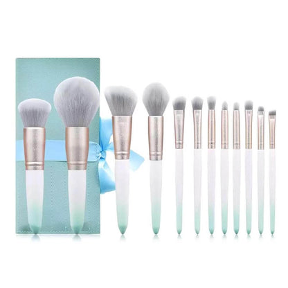 12 pc. White and Blue gradient handle makeup brushes with blue clutch