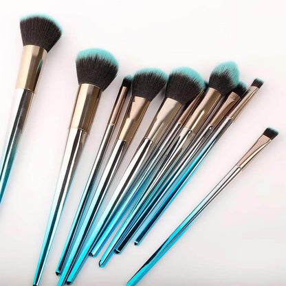 7 pc. Unicorn brush set displayed with gold and blue gradient handles