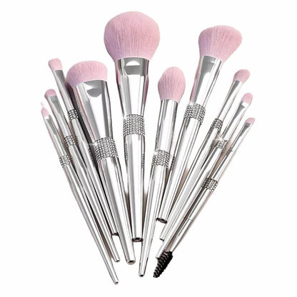 11 pc. Silver metallic makeup brushes with pink bristles and rhinestone detail