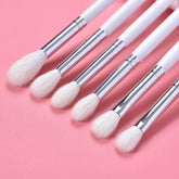 Closeup of white bristled brushes
